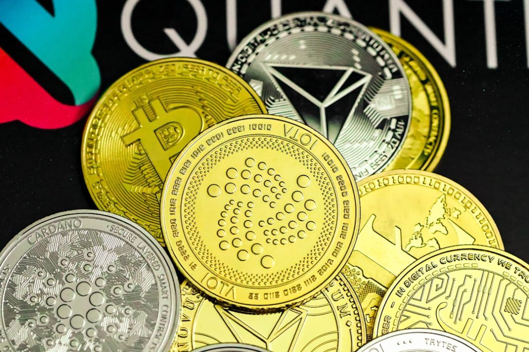 a pile of bitcoins sitting on top of a table